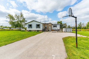 Spacious and full of potential, this 3 1 bedroom, 2 bathroom home sits on nearly a full acre corner lot just 10 minutes from Lindsay.