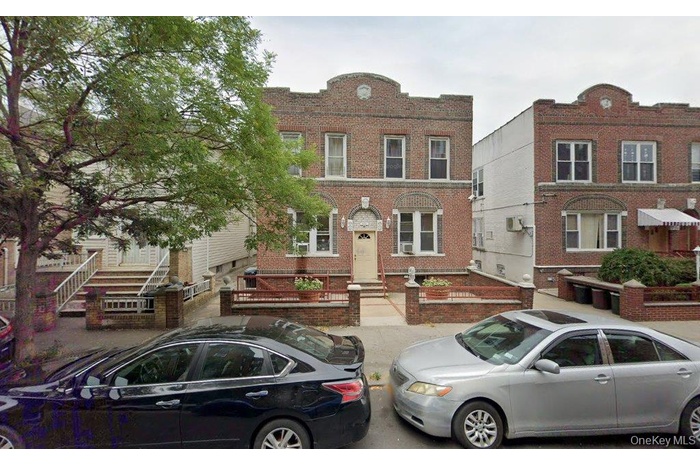 View of front of home with brick siding