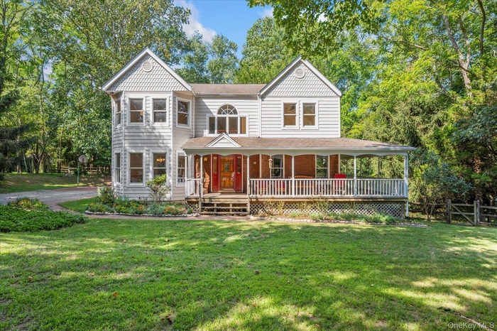 Victorian house featuring a porch