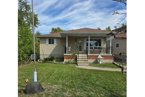 Situated in the prestigious waterfront community of Lagoon City, this 1584 sq ft bungalow has direct waterfront, 4 bdrm, 1.