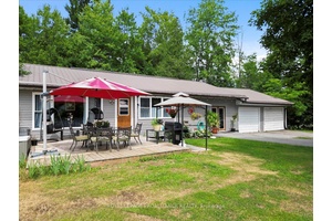 Welcome to this inviting 3 bedroom, 2 bathroom bungalow ideally located in a quiet subdivision on a dead end road offering peace, privacy and a true connection to nature.