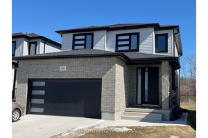POND LOT ! The EMERALD 2 model with 1862 sq ft of luxury finished area backing onto pond.