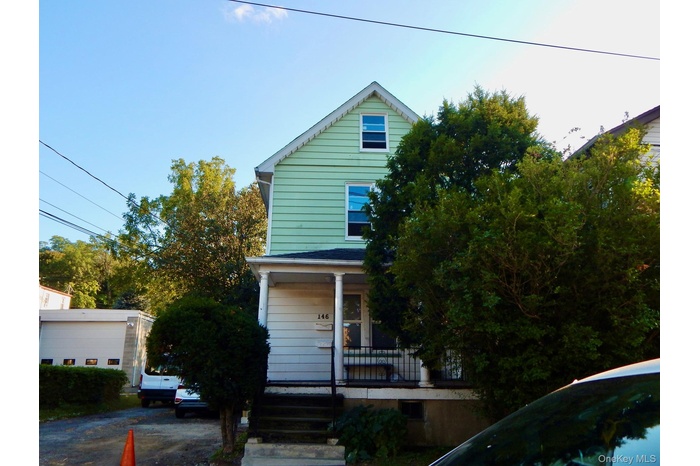 View of front of house featuring a porch