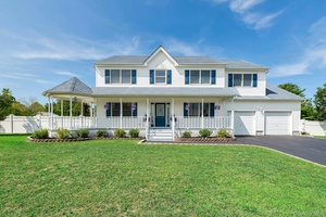 Welcome to your North Fork retreat a bright, immaculate colonial that blends timeless style with today s modern comforts.