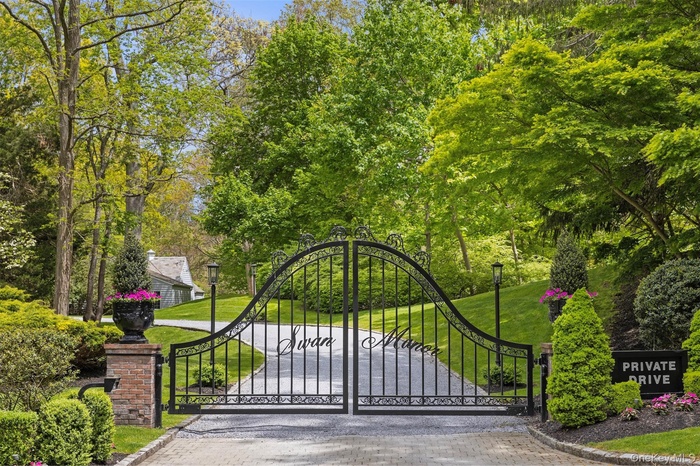 View of gate featuring a yard