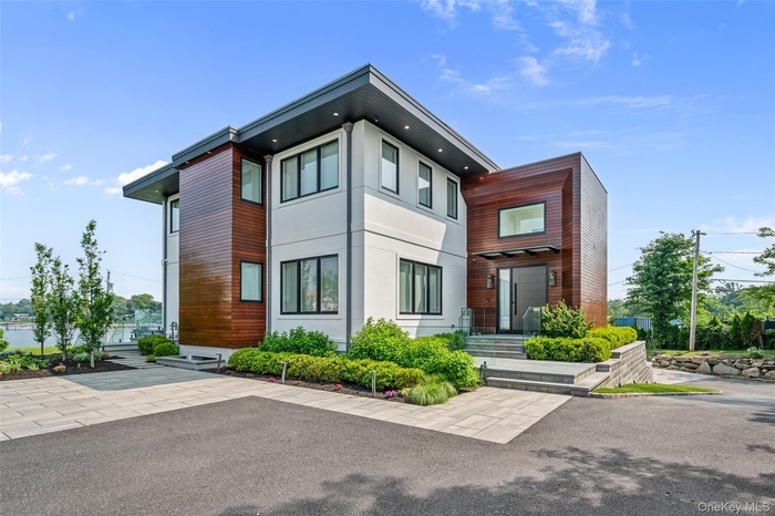 View of front of house with stucco siding