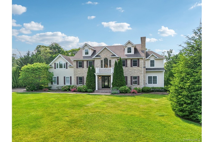 Traditional Gorgeous and Impeccable Home/Stone and HardiBoard Planking