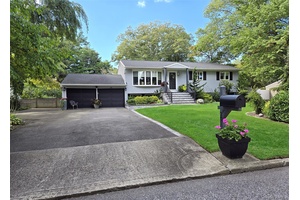 This Move in Ready 4 bedrooms, 3 full bath Hi Ranch is a gem.