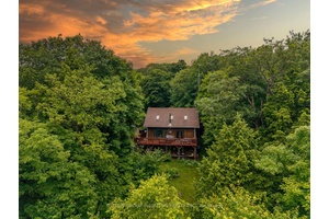 Welcome to this charming property set on 15 acres, where nature and comfort come together.
