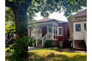 Welcome to this stunning, freshly renovated main floor home at 166 Harvie Ave, ideally located in the vibrant Corso Italia Davenport neighbourhood.