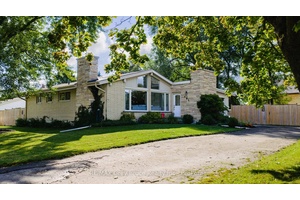 SO MUCH CURB APPEAL ! This lovely 3 bedroom, 2 bath home situated on a corner lot in a popular neighbourhood in a centrally located town of Chesley.