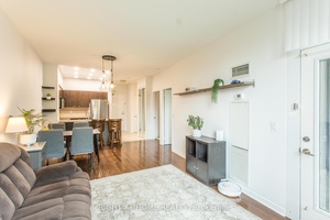 Rare Opportunity ! Discover this bright and modern almost 700 sqft unit with soaring 10 foot ceilings and an exceptional walk out terrace that feels like your own little patio.