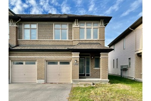Welcome to this beautiful end unit townhouse in the heart of Barrhaven, offering 3 bedrooms plus a loft and 2.