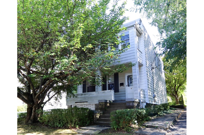 View of front facade featuring covered porch