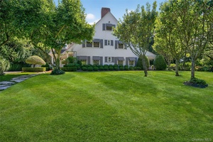 Discover timeless sophistication at 42 Clock Tower Lane, Old Westbury.