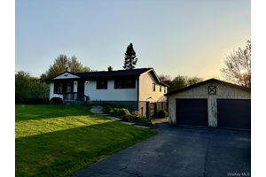 Wonderful move in condition 3BR, 2B renovated L Shaped ranch home in Tri Valley Schools.