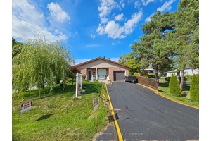 Discover this beautifully renovated, sun filled bungalow nestled in the heart of South Keswick.