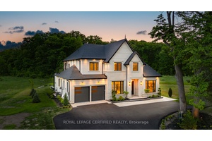 Discover refined luxury in this custom built 4 bedroom residence, ideally located near Burlingtons prestigious Bluffs neighbourhood.