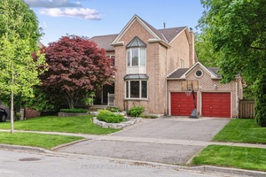 Welcome to this stunning 5 1 bedroom, 4 bathroom home nestled in one of Pickering's most sought after neighborhoods, backing onto a serene ravine lot.
