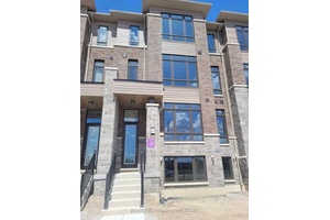 Town House with open concept model kitchen, 3 1 bedrooms with 4 washrooms and 2 Parking.
