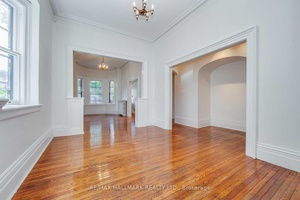 Discover modern comfort and classic charm at 206 Dunn Avenue, ideally situated in one of downtown Toronto's trendiest neighborhoods.
