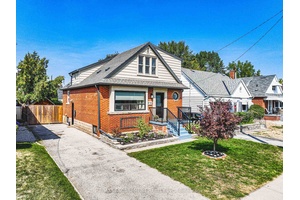 Discover this charming property at 212 Rodgers Road, a stunning detached home that seamlessly blends historic brick curb appeal with modern upgrades.