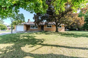 RARE OVERSIZED LOT ! ! Welcome to 509 Rose Street, a unique bungalow set on a rare oversized lot extending nearly 170 feet deep offering incredible space, privacy, and future ...