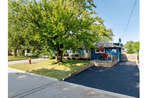Nestled in a tranquil crescent w spacious lots amp ; mature trees, this home is located just two streets north of Lake Ontario.