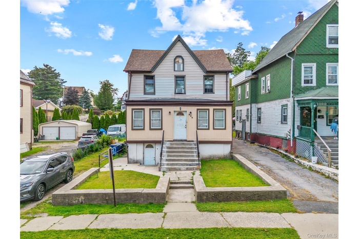 View of front of home 450 Franklin ave, Mt vernon featuring a residential view and a shingled roof