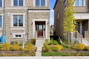 NOT TO BE MISSED ! This is a NEVER LIVED IN, LIKE BRAND NEW End Unit Townhome with Double Garages, 2 Driveway Parking Spaces and direct access into welcoming living ...