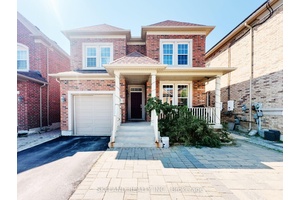 Welcome to this bright and spacious detached home built by Monarch, featuring professional landscaping in both the front and backyard.