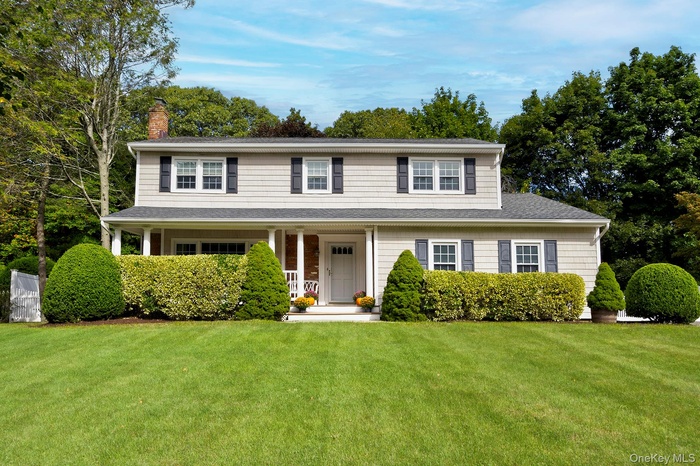 12 Foxdale Court has a covered front porch porch