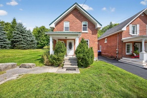 Charming 3 bedroom and 2 bath century home located on one of Midlands' finest and most desirable streets.