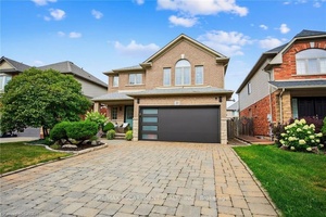 This quality John Bruce Robinson built home is situated on a tree lined street with no sidewalks.