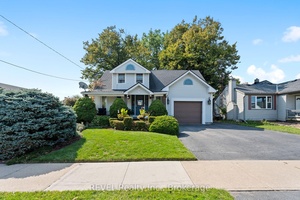 The backyard gardens and tree covered 1000 sq ft deck is truly a show stopper !