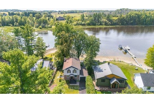 Imagine your everyday escape to a Beautifully Updated Waterfront home, where the Ottawa River becomes your backyard.