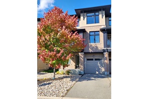Nestled on a quiet street and facing the serene Leather Leaf Park, this beautifully appointed 3 storey executive end unit townhome is sure to impress.