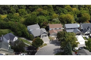 Ravine lot, located in a serene setting surrounded by mature trees, stunning 5 level back split offers complete privacy with over 3, 000 sqft.