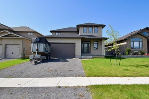 This stunning all brick, 2 story residence offers 2, 174 square feet of thoughtfully designed living space and a double car attached garage.