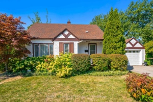 Charming tudor style 1. 5 storey home in the desirable north end of St.