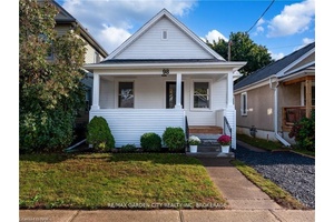 This beautiful bungalow is in a great midtown neighborhood and has been completely renovated from top to bottom, both inside and out.