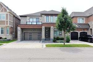 Welcome to a Luxurious 6 BR, 5 WR Contemporary Style Detached Home with UNIQUE main floor In LawSuite w Ensuite can also use an Office in prestigious Preserve neighbourhood.