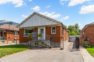 Welcome to this beautifully renovated bungalow offering 1, 450 sq.