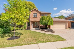 Welcome to this beautiful 4 bedroom executive home, set on a stunning 1 3 acre lot with picturesque pond views.
