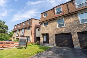 Spacious End Unit Condo Townhome Backing onto Garden amp ; Pool.