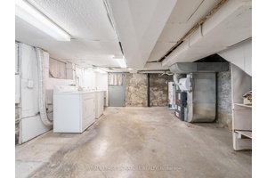 Opportunity awaits ! Step into this character filled classic red brick semi, nestled on a quiet street in the heart of the vibrant Wallace Emerson Junction.