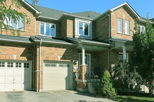 This charming townhome features three spacious bedrooms, including a generously sized primary suite designed for comfort and relaxation.