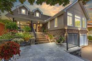 Welcome to this beautifully updated custom built elevated bungalow nestled in one of the areas most sought after neighborhoods.