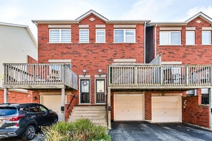 Immaculate condo townhouse in a highly sought after uptown Burlington neighbourhood !