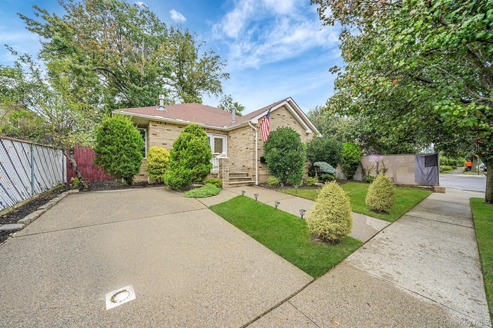 View of front of property with brick siding